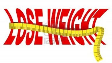 14338281-text-lose-weight-with-tape-measure-isolated-over-white