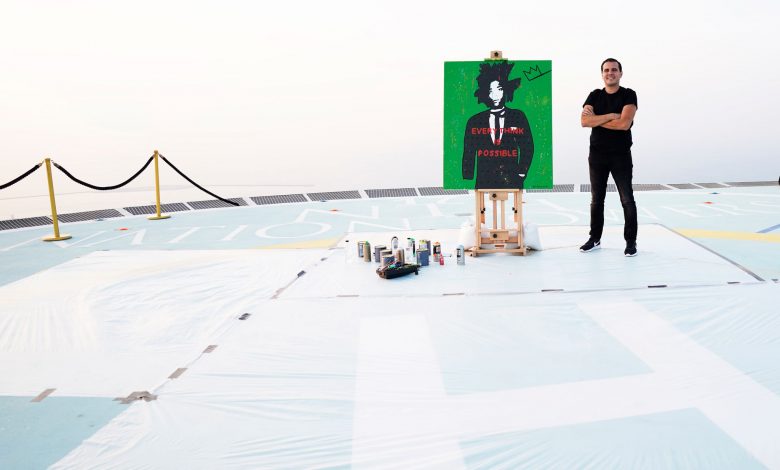 أبوظبي تنظم حدث لأول فنان يرسم لوحة على الهواء مباشرة من ارتفاع يصل إلى 225 متر