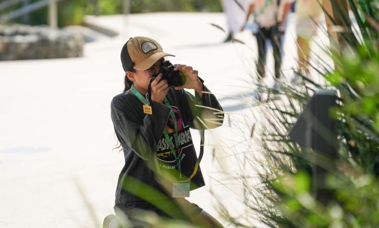 Hands-on photography workshops with Nikon, inspiring young explorers to see nature through a new lens