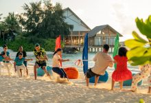 MLEAI Family Beach Games with Kids Club Team.jpg