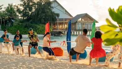 MLEAI Family Beach Games with Kids Club Team.jpg