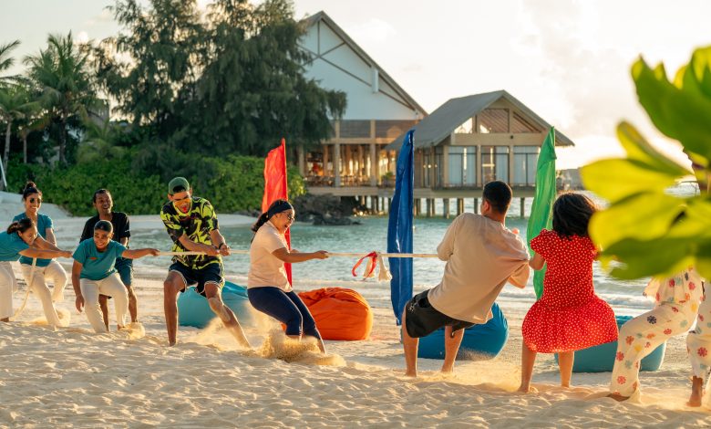 MLEAI Family Beach Games with Kids Club Team.jpg